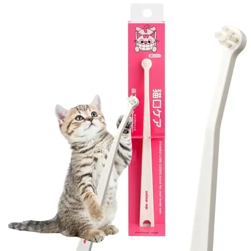 MIND UP Cat toothbrush with a small, flat micro brush head and a slightly angled handle.