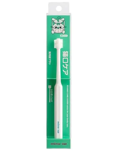 MIND UP cat toothbrush with a cylindrical brush head and a straight handle.