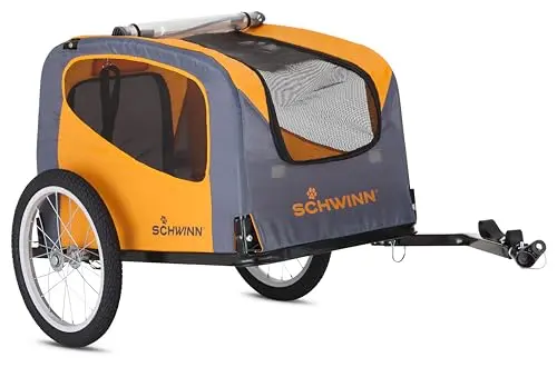 Schwinn Rascal bike pet trailer in orange and grey, showing folding frame and large wheels