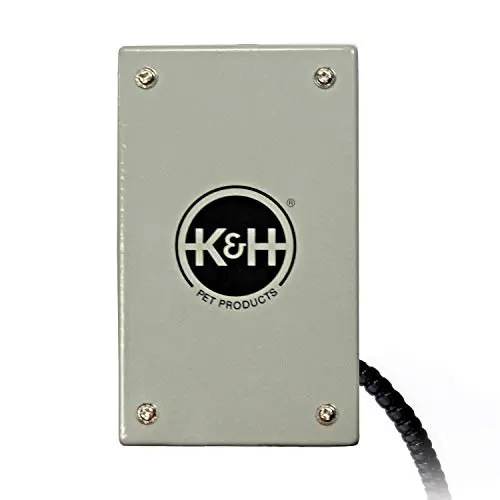 K&H Snuggle-Up Bird Cage Heater mounted on the side of a cage
