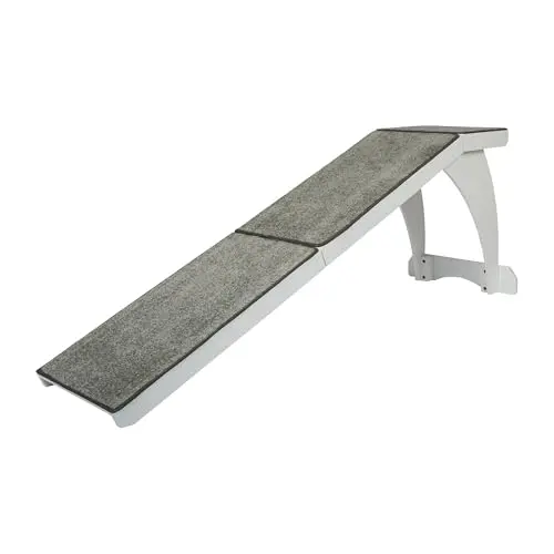 PetSafe white wooden dog ramp with carpet leading to a bed