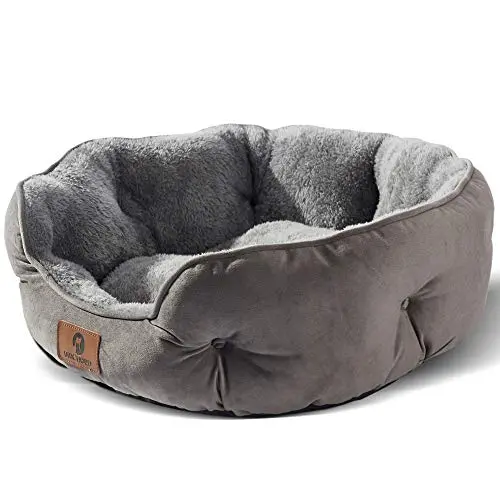 Asvin round pet bed with soft Sherpa fleece and water-resistant oxford bottom