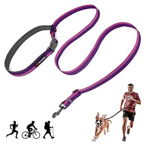 Tuff Pupper adjustable-length hands-free dog leash in punch purple, showing the aircraft aluminum adjuster and reflective strips