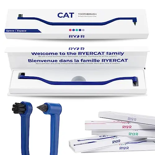 RYERCAT dual-sided cat toothbrush with a brush on one end and a pick on the other, shown in a purple color.
