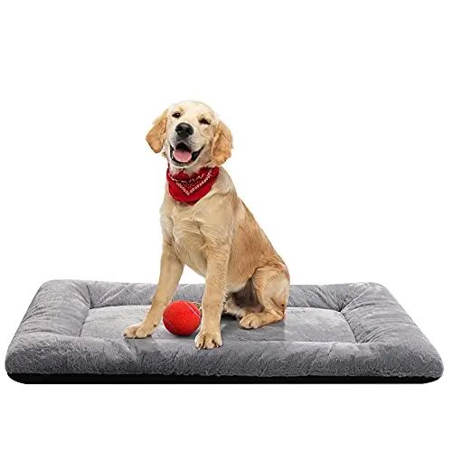 VERZEY grey faux fur dog crate pad lying flat inside a medium-sized wire crate.