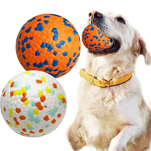 Two orange and white durable dog balls designed for tough chewers.