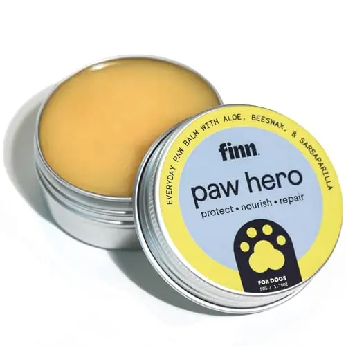 Finn Paw Hero dog paw balm in a cream-colored recyclable tin