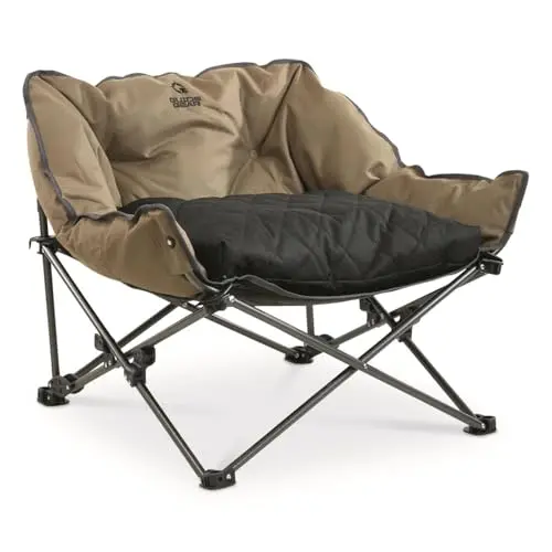 Guide Gear brown padded portable pet cot with a removable cushion, shown folded
