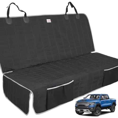 Reliadura gray bench-style dog seat cover with storage pockets in a truck.