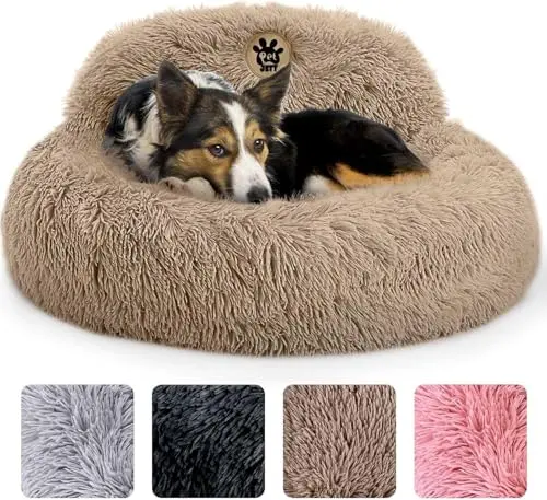 PetJett beige round donut dog bed with a built-in support pillow and fluffy plush