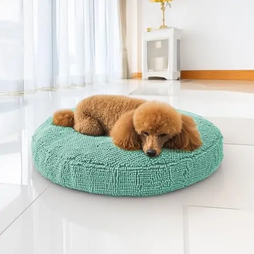 Muddy Mat seafoam green donut dog bed made of soft chenille fabric with a removable cover